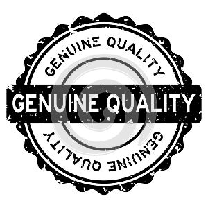 Grunge black genuine quality word round rubber stamp on white background