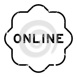 Grunge black online word rubber stamp on white ckground photo