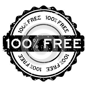 Grunge black 100 percent free word round rubber stamp on white background