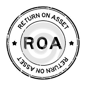 Grunge black ROA Abbbreviation of Return on assets word round rubber seal stamp on white background