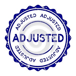 Grunge blue adjusted word round rubber stamp on white background