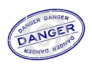 Grunge blue danger word oval rubber stamp on white background