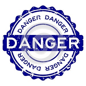 Grunge blue danger word round rubber stamp on white background