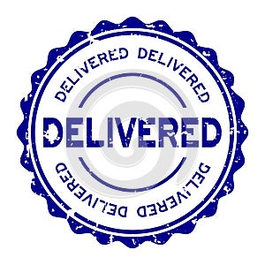 Grunge blue delivered word round rubber stamp on white background