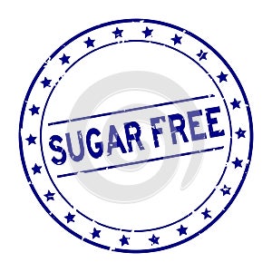 Grunge blue sugar free word with star icon round rubber stamp on white background