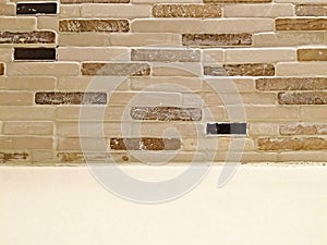 Grunge brick wall with white shelf as a background and copy space