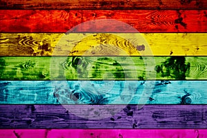 Grunge colorful wood planks background in rainbow colors