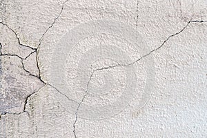 Grunge concrete cement wall with crack in industrial building