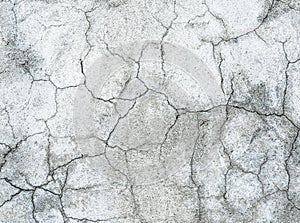 Grunge concrete cement wall with crack in industrial building