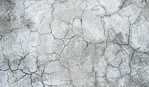 Grunge concrete cement wall with crack in industrial building, great for your design and texture background