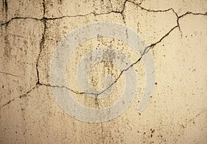 Grunge concrete cement wall with crack in industrial building