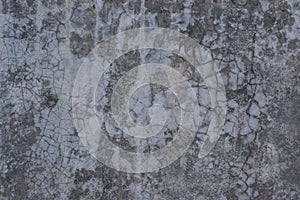 Grunge concrete wall with crack and stains