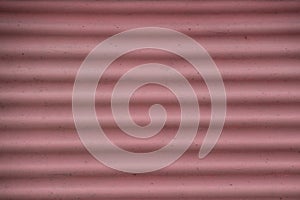 Grunge corrugated faded red pink background