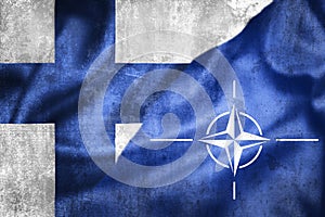 Grunge flags of Finland and NATO illustration photo