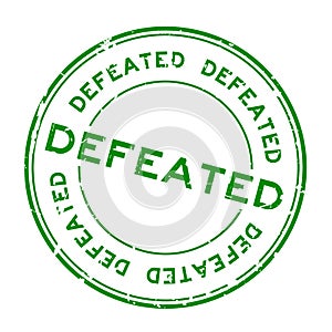 Grunge green defeated round rubber stamp on white background