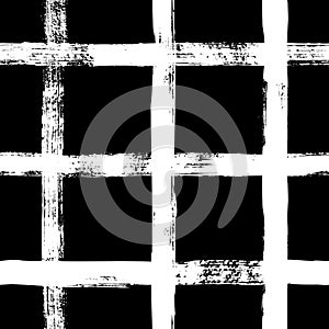 Grunge grid seamless pattern. Abstract plaid texture hand drawn with a ink brush strokes. Vector Monochrome background