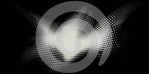 Grunge halftone texture with triangular pattern against a black background