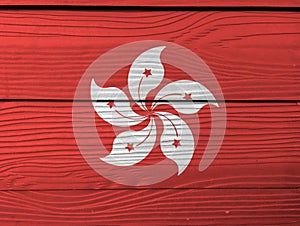 Grunge Hong kong flag texture, the red and white five petal Bauhinia blakeana flower.