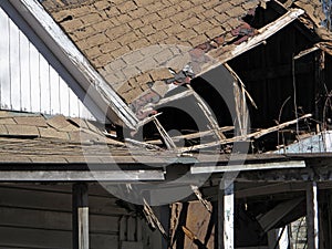 Grunge House with a Collapsed Roof. photo
