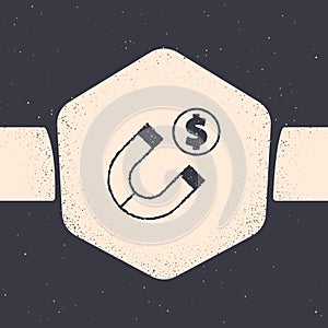 Grunge Magnet with money icon isolated on grey background. Concept of attracting investments. Big business profit