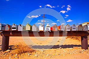 Grunge mail boxes in California Mohave desert USA photo