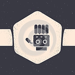 Grunge Mechanical robot hand icon isolated on grey background. Robotic arm symbol. Technological concept. Monochrome