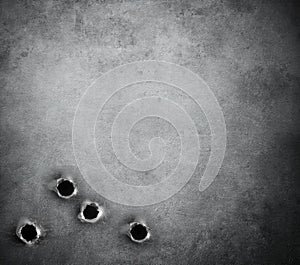 Grunge metal background with bullet holes