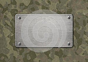 Grunge metal plaque with military camouflage 3d illustration