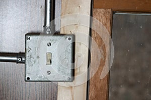 Grunge metal surface mounted electricity switch