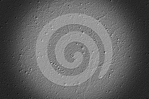 Grunge neutral grey black slate stone background or texture, circular dark vignetting photo