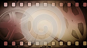 Grunge old motion picture reel with film strip