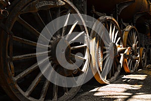 Grunge old steam locomotive wheels