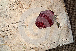 Grunge paper with sealing wax