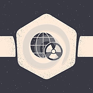 Grunge Planet earth and radiation symbol icon isolated on grey background. Environmental concept. Monochrome vintage