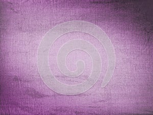 Grunge purple distressed gradient background with light centre