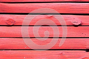 Grunge red color wood plate textured background for decoration or advertisement