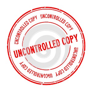 Grunge red uncontrolled copy word round rubber stamp on white background photo