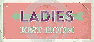 Grunge retro restroom metal sign. Ladies old board. Vintage poster with arrow. Old fashioned design.