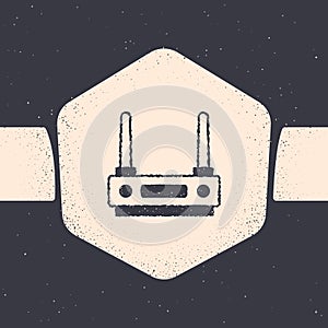 Grunge Router and wi-fi signal icon isolated on grey background. Wireless ethernet modem router. Computer technology