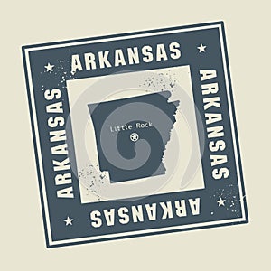 Grunge rubber stamp with name and map of Arkansas, USA
