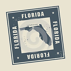 Grunge rubber stamp with name and map of Florida, USA