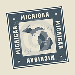 Grunge rubber stamp with name and map of Michigan, USA