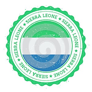 Grunge rubber stamp with Sierra Leone flag. photo