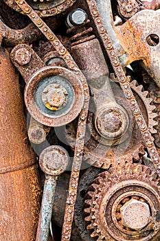 Grunge rusty gear wheels and other components of industrial mach