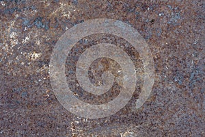 Grunge rusty metal background or texture with scratches and cracks, closeup, top view