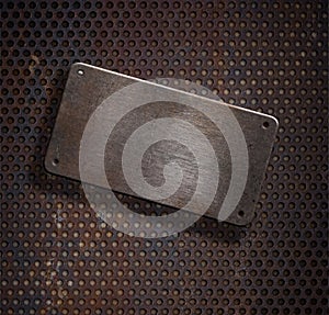 Grunge rusty metal plate over grid background