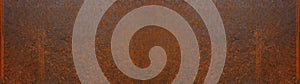 Grunge rusty orange brown metal corten steel stone background texture banner panorama