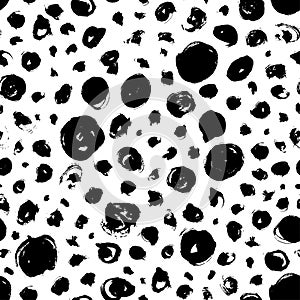 Grunge spots hand drawn vector seamless pattern. Ink dirty circles texture.