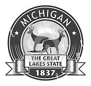 Grunge stamp or label with name of Michigan