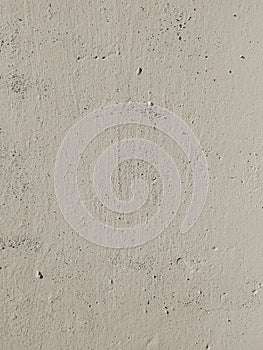 Grunge texture of an old plaster wall. Weathered concrete surface with damages and scratches. Minimal background.